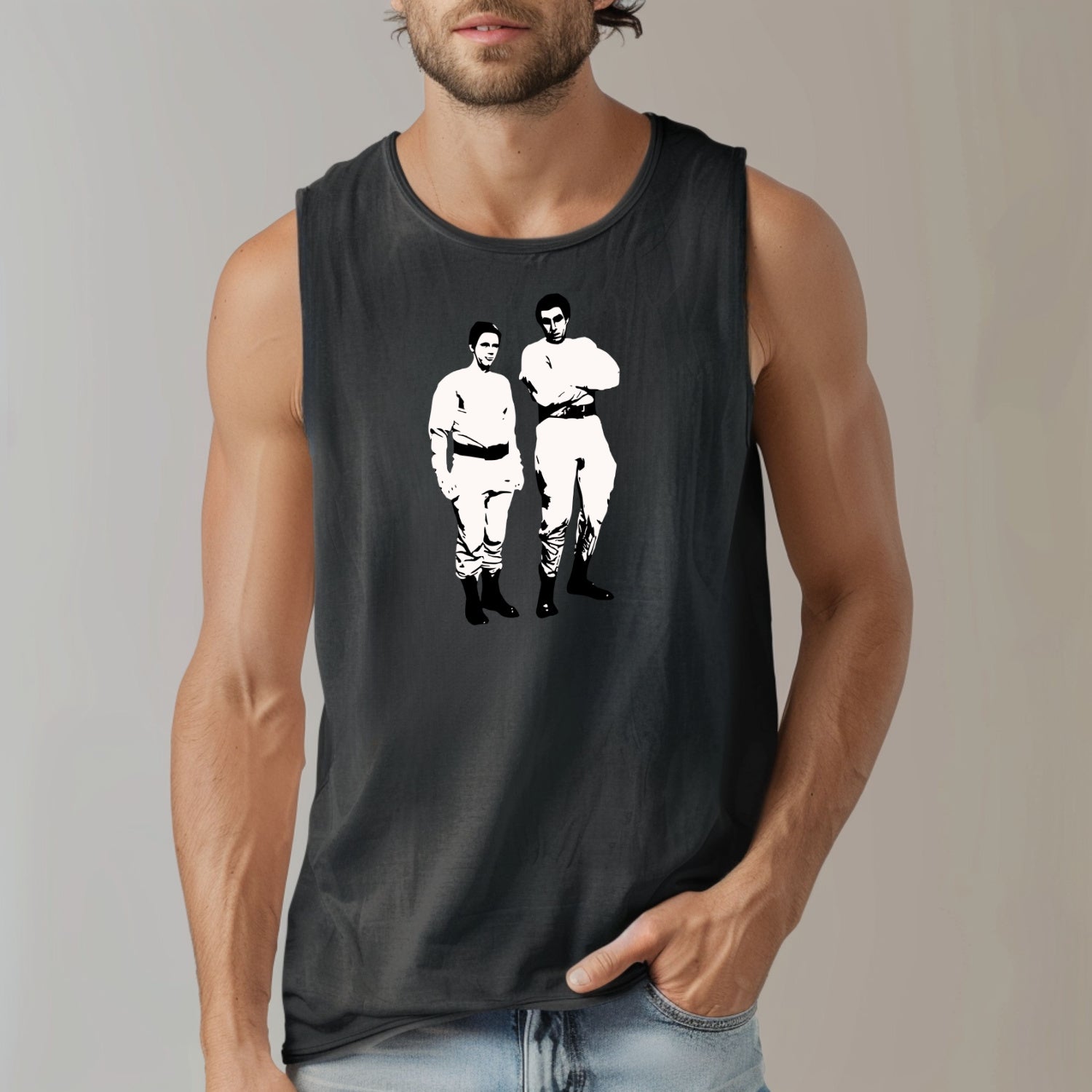 a man wearing a tank top with a picture of two men on it